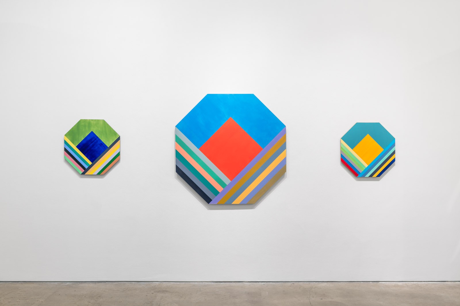 Installation view of ORRA paintings
